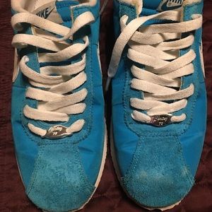 Well worn Nike Cortez size 7